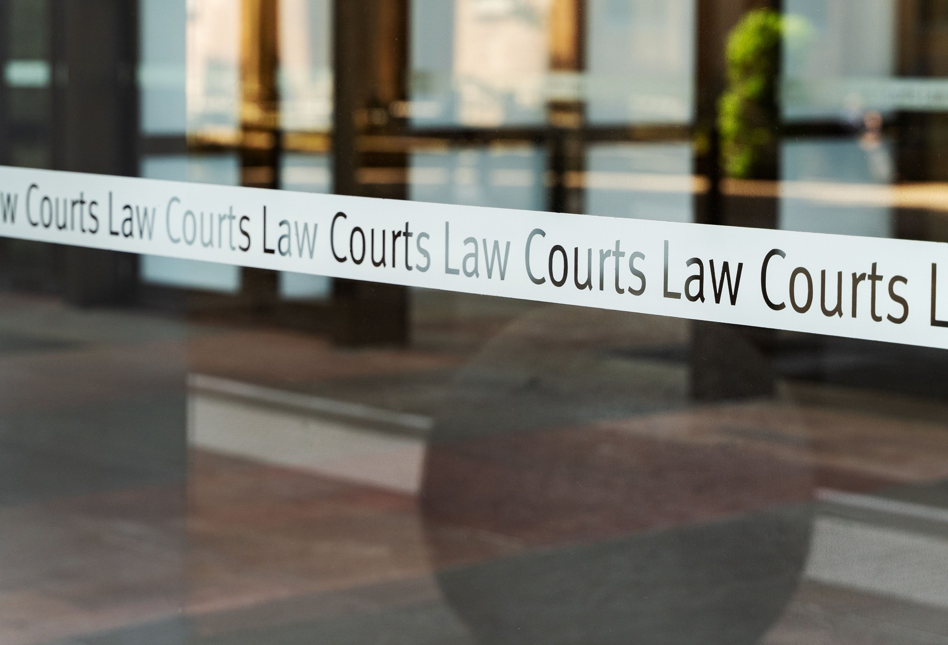 View of sign of The Law Courts in Sydney CBD